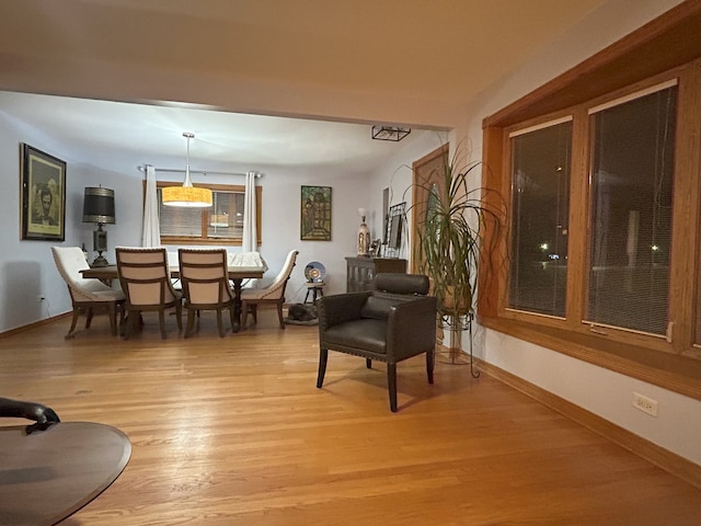 living room with light wood-style floors and baseboards