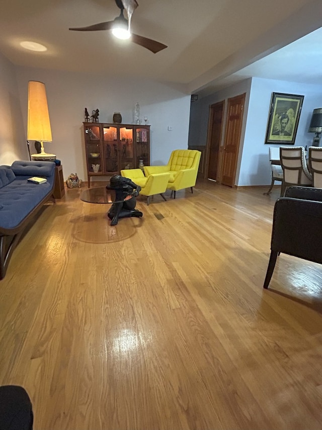 bedroom with wood finished floors and ceiling fan