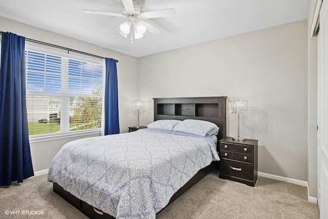 1683 Rockefeller Dr, Mundelein, IL 60060 - carpeted bedroom with baseboards and ceiling fan