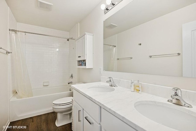1683 Rockefeller Dr, Mundelein, IL 60060 - full bathroom featuring toilet, shower / bath combo, wood finished floors, and double vanity