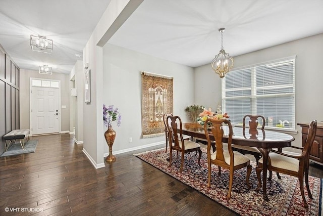 1683 Rockefeller Dr, Mundelein, IL 60060 - dining space featuring a chandelier, baseboards, and dark wood finished floors