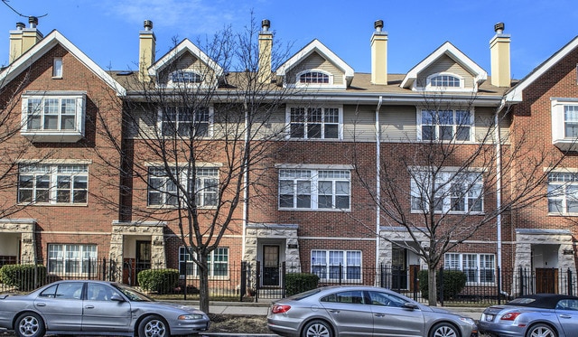 view of front of house featuring brick siding
