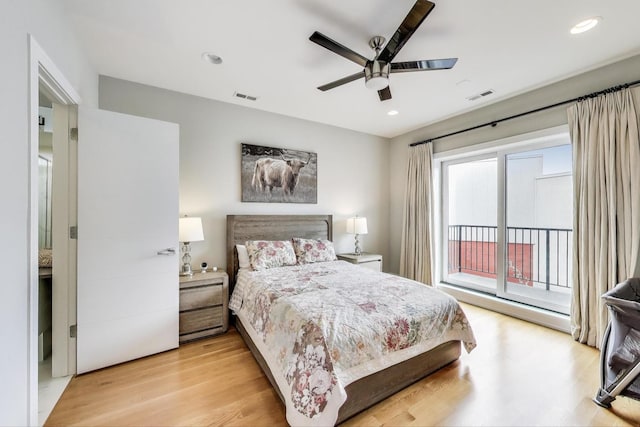 bedroom with light wood-style floors, visible vents, access to exterior, and recessed lighting