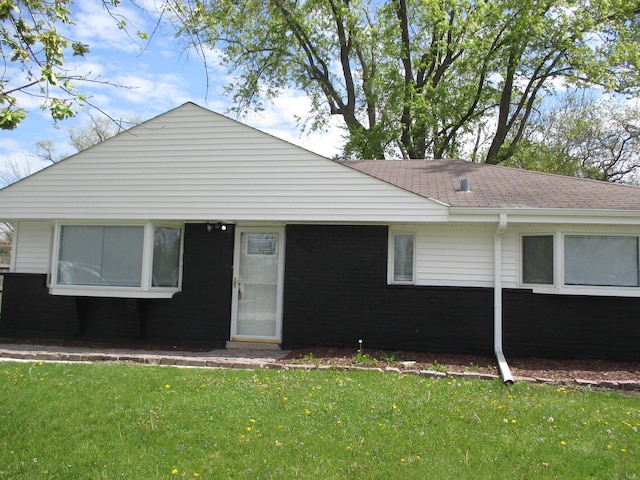 439 Indianwood Blvd, Park Forest, IL 60466 - view of front of house featuring a front yard and a shingled roof
