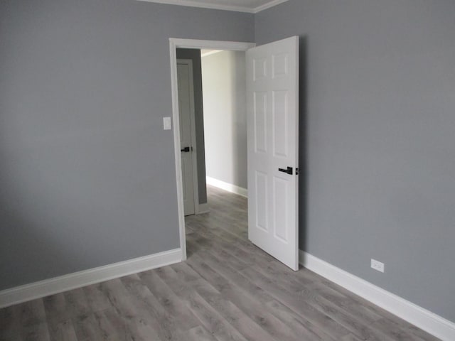 439 Indianwood Blvd, Park Forest, IL 60466 - unfurnished room featuring ornamental molding, baseboards, and wood finished floors