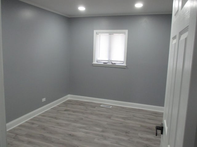 439 Indianwood Blvd, Park Forest, IL 60466 - spare room featuring wood finished floors, baseboards, and recessed lighting