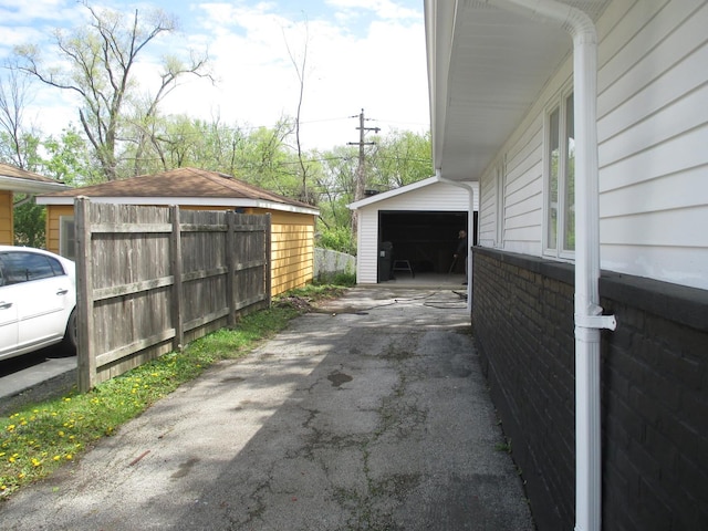439 Indianwood Blvd, Park Forest, IL 60466 - view of side of property featuring fence and driveway