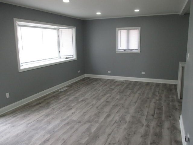439 Indianwood Blvd, Park Forest, IL 60466 - empty room with wood finished floors, baseboards, ornamental molding, and recessed lighting