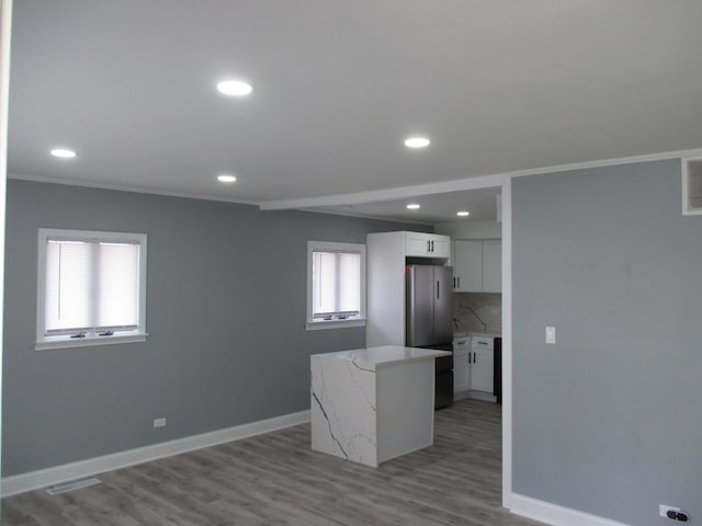 439 Indianwood Blvd, Park Forest, IL 60466 - kitchen with freestanding refrigerator, recessed lighting, baseboards, white cabinets, and decorative backsplash