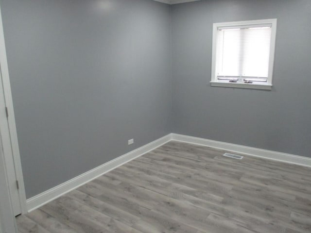 439 Indianwood Blvd, Park Forest, IL 60466 - empty room featuring wood finished floors and baseboards