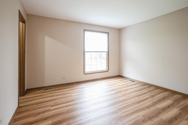 1326 Narragansett Dr, Carol Stream, IL 60188 - unfurnished room featuring light wood-style floors and baseboards