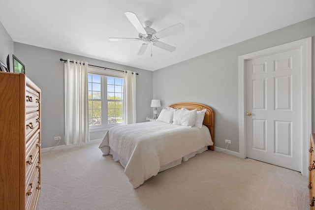 610 Wind Energy Pass, Batavia, IL 60510 - bedroom with light carpet, baseboards, and a ceiling fan
