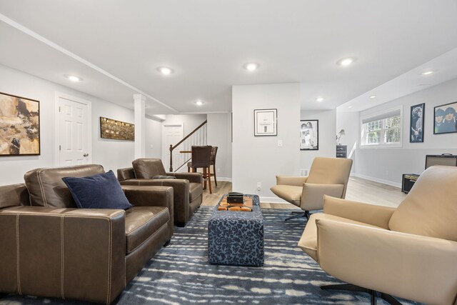 610 Wind Energy Pass, Batavia, IL 60510 - living area with stairs, wood finished floors, recessed lighting, and baseboards