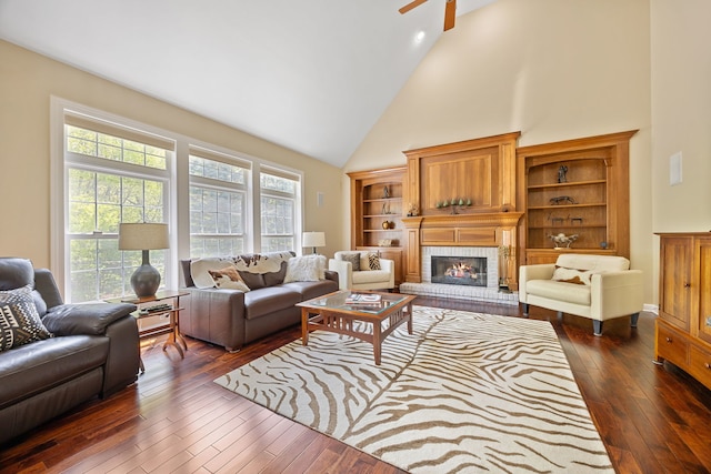 610 Wind Energy Pass, Batavia, IL 60510 - living area featuring high vaulted ceiling, dark wood-type flooring, a brick fireplace, and a ceiling fan