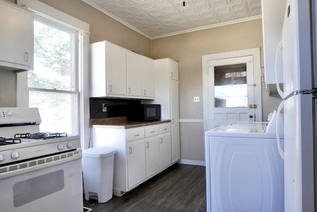 221 N Main St, Wilmington, IL 60481 - kitchen with washer / clothes dryer, white appliances, an ornate ceiling, dark wood finished floors, and white cabinets