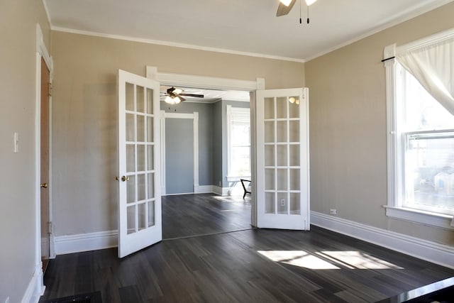 221 N Main St, Wilmington, IL 60481 - spare room with french doors, ornamental molding, dark wood-type flooring, ceiling fan, and baseboards