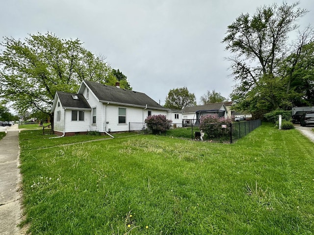 view of property exterior with fence