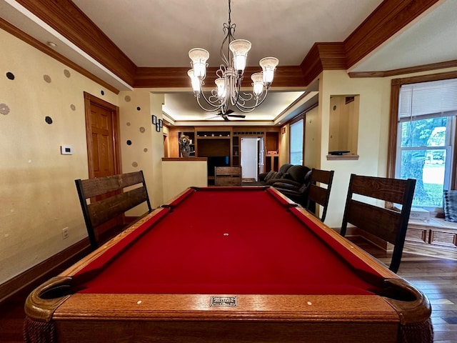 game room with crown molding, pool table, a notable chandelier, and wood finished floors