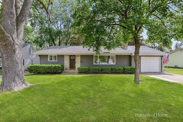 232 S Randall Rd, Aurora, IL 60506 - view of front of home featuring driveway, a garage, a front lawn, a chimney, and a shingled roof