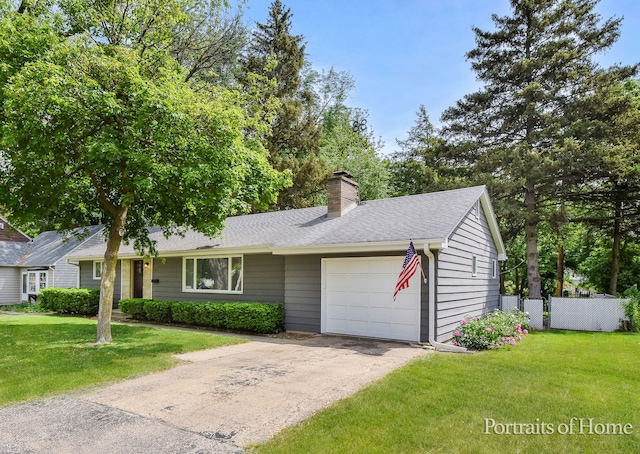 232 S Randall Rd, Aurora, IL 60506 - view of front of property featuring an attached garage, a chimney, driveway, and a shingled roof