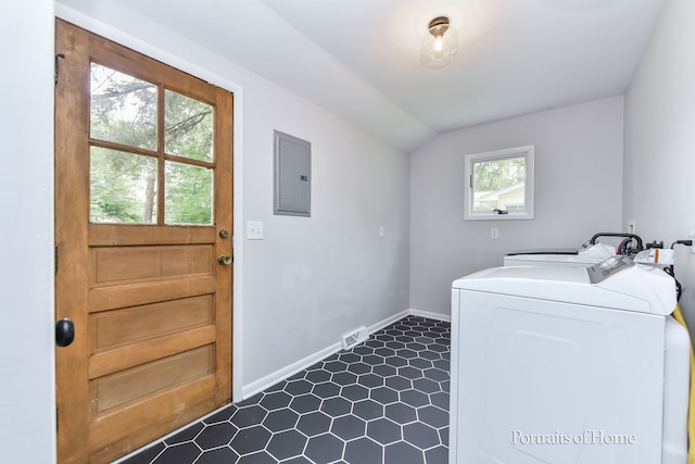 232 S Randall Rd, Aurora, IL 60506 - laundry room with electric panel, baseboards, and dark tile patterned floors