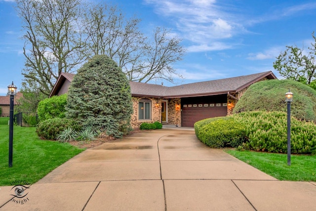 view of front of home featuring roof with shingles, a front yard, a garage, brick siding, and concrete driveway