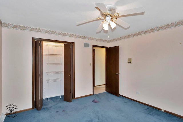 unfurnished bedroom featuring a ceiling fan, visible vents, baseboards, a closet, and carpet flooring