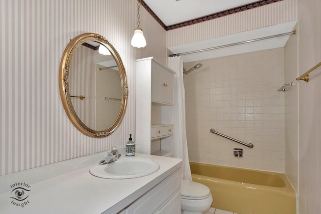 full bathroom with vanity, shower / bath combo, toilet, and wallpapered walls