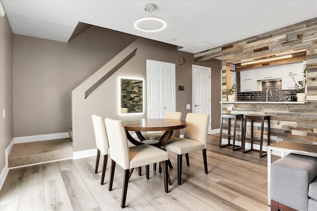 436 Yorktown Ct, Aurora, IL 60504 - dining area with baseboards and light wood-type flooring