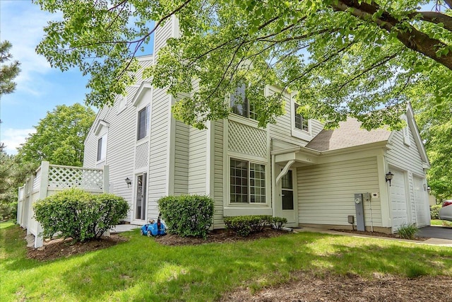 436 Yorktown Ct, Aurora, IL 60504 - exterior space with a garage, a chimney, and a yard