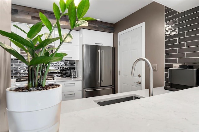 436 Yorktown Ct, Aurora, IL 60504 - kitchen featuring a sink, white cabinets, backsplash, and high quality fridge
