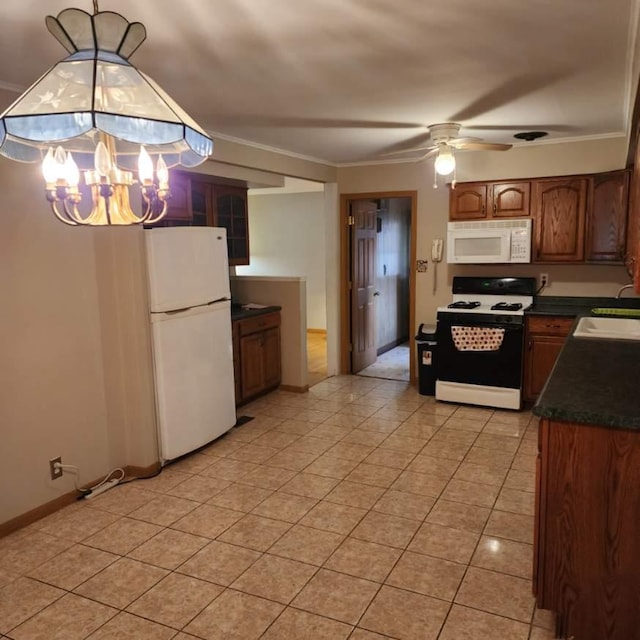 5900 W 110th St, Chicago Ridge, IL 60415 - kitchen with a sink, white appliances, ceiling fan with notable chandelier, light tile patterned floors, and dark countertops