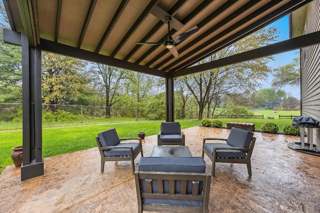 view of patio with a fenced backyard, a ceiling fan, and an outdoor hangout area