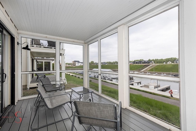 sunroom / solarium featuring a wealth of natural light