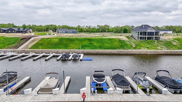 property view of water with a dock