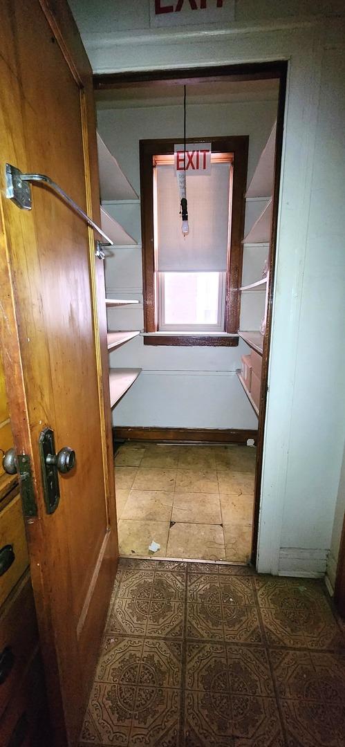 7943 S Vernon Ave, Chicago, IL 60619 - hall featuring tile patterned floors