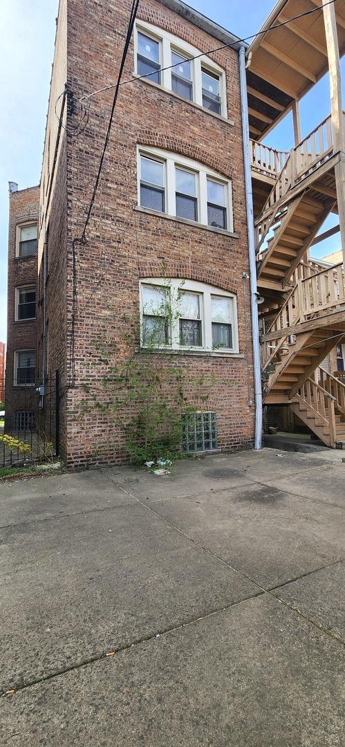 7943 S Vernon Ave, Chicago, IL 60619 - view of property featuring stairway