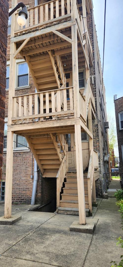 7943 S Vernon Ave, Chicago, IL 60619 - view of building exterior featuring stairs
