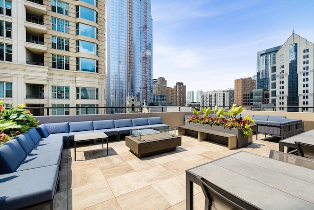 view of patio / terrace featuring outdoor lounge area and a view of city