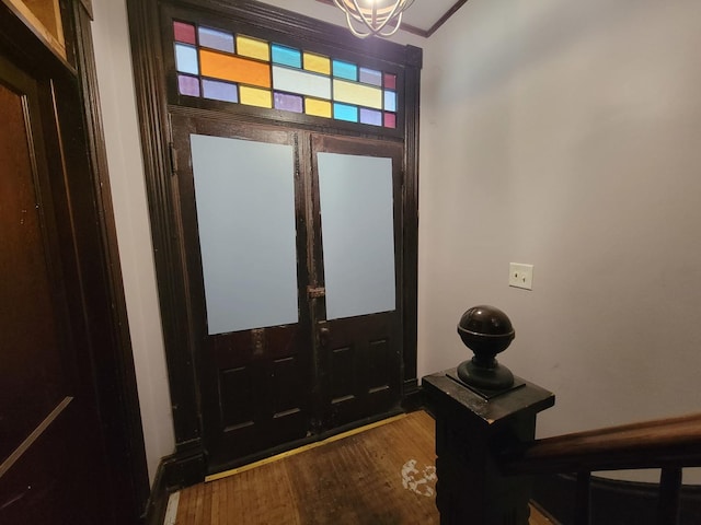 foyer entrance with wood finished floors