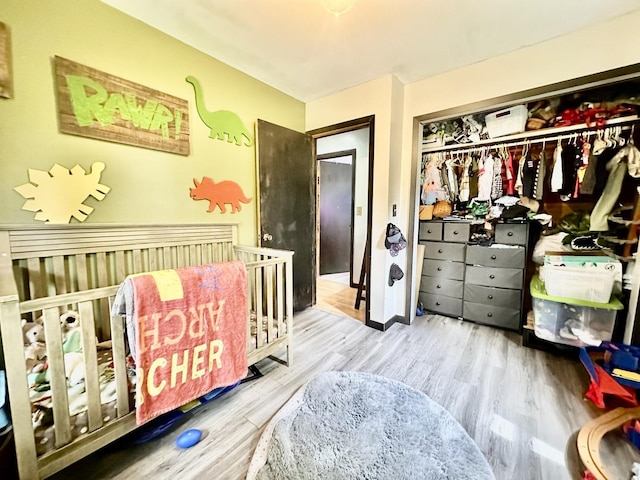 1310 E 15th Rd, Streator, IL 61364 - bedroom featuring a closet and wood finished floors