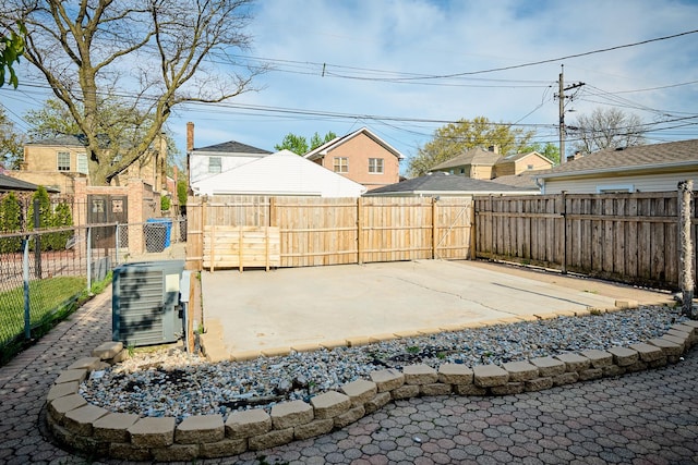 view of patio / terrace featuring central AC unit and a fenced backyard