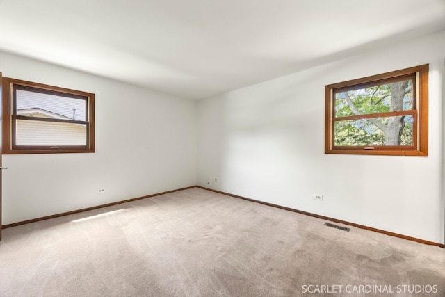 6540 Terrace Dr, Downers Grove, IL 60516 - unfurnished room featuring light colored carpet and baseboards