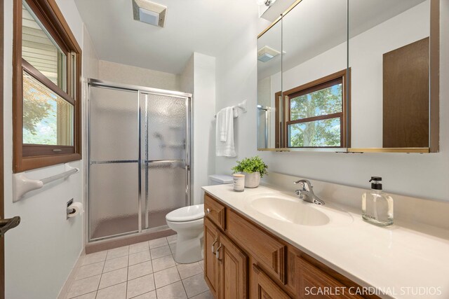 6540 Terrace Dr, Downers Grove, IL 60516 - full bath with toilet, vanity, tile patterned flooring, and a stall shower