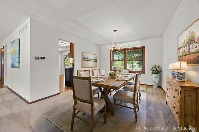 6540 Terrace Dr, Downers Grove, IL 60516 - dining room featuring a chandelier, healthy amount of natural light, and baseboards