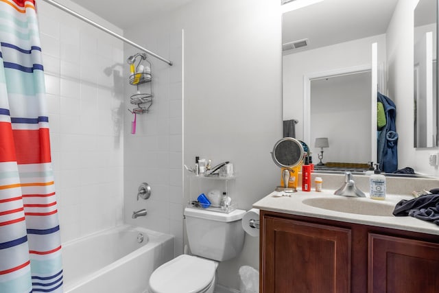 full bath featuring toilet, visible vents, vanity, and shower / bathtub combination with curtain