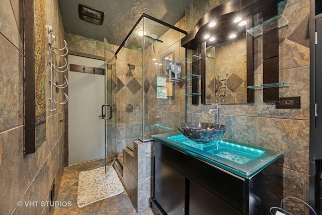 20W315 S Frontage Rd, Lemont, IL 60439 - bathroom with tile walls, vanity, and a stall shower