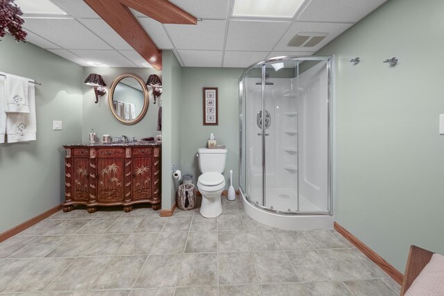 2835 N Bulrush Ct, Coal City, IL 60416 - bathroom featuring a drop ceiling, baseboards, a stall shower, vanity, and tile patterned floors