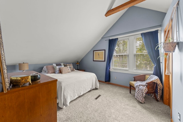 carpeted bedroom with baseboards