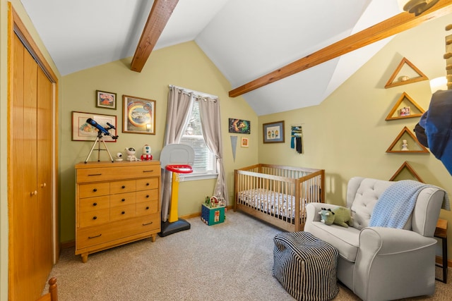bedroom with carpet and a crib